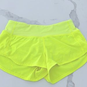 Lululemon highlight yellow speed up shorts. size: 2 length: 2.5